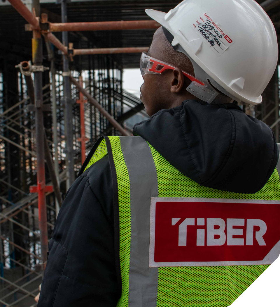 Tiber construction worker overseeing a project
